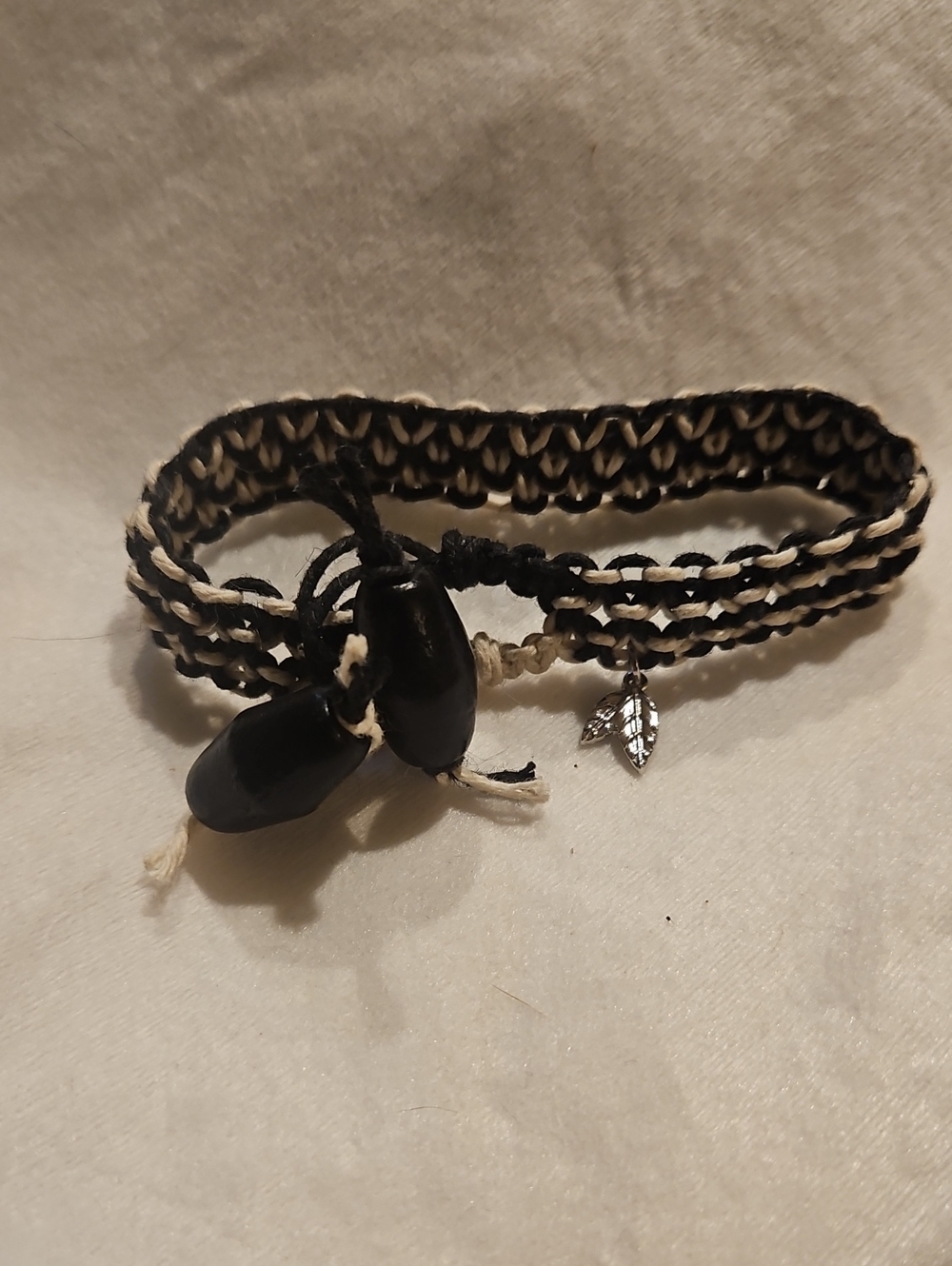 Handmade Black and Cream Woven Leaf Charm Bracelet